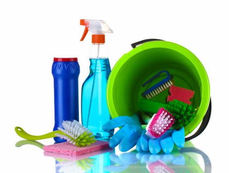 Commercial cleaning professional sanitizing office surfaces
