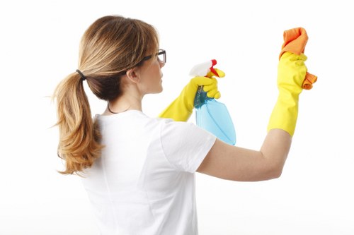 Cleaner maintaining a shared corridor and stairwell